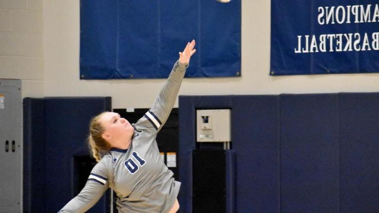 Penn State DuBois senior Paige Pleta follows through on her strike during the home match against Penn State New Kensington at the PAW Center.