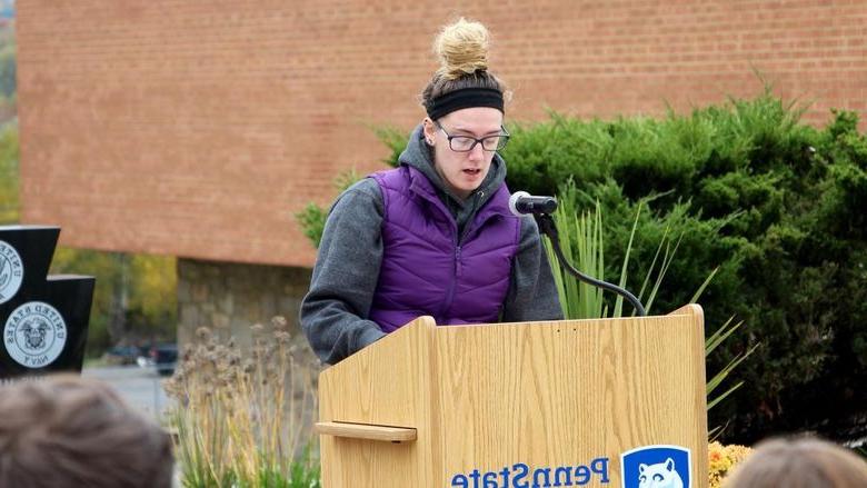 Fourth year student Cierra Hoffman shares one of the testimonials during the victimology event at Penn State DuBois.